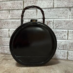 Vintage Etienne Aigner hand bag with bamboo handle.